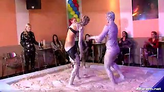 wild mud wrestling between two hot babes