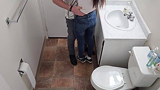 Skinny brunette gets fucked from behind in standing pose – toilet quickie