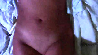 woman plays with herself and cums