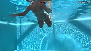 Sexy mermaid Puzan Bruhova performs her hot underwater show