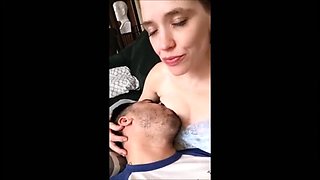 Sweet wife breastfeeds her husband until he cums