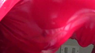 MILF in Red Latex Suit and Patent Leather High Heels Gives a Blowjob with Swallow