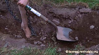 Cute slave girl with small boobs works with shovel in the yard