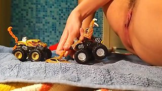 Sexy Hairy MILF Puts Toy Cars in Her Pussy and Has Real Orgasm