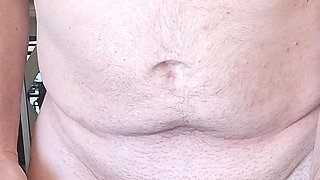 Exhibitionist masturbator testing a new bottle for cock play