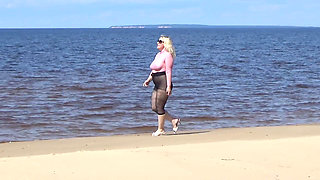 Funny MILF with Nylon Ass and Tits on Beach