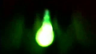 Slender white lady uses glowing stick for masturbation