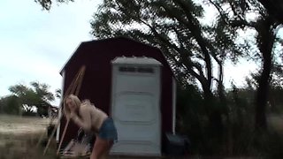 Blonde is flashing her big boobs in the outdoors