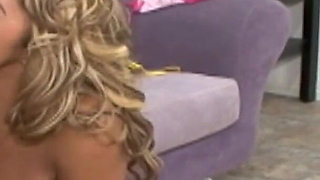 Lovely tanned blonde fucks in her wet pussy