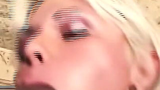 Blonde Tranny Bitch Sucks 2 Cocks in Interracial Threesome.
