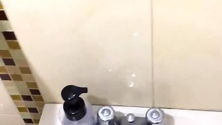 Public Restroom Thrill: Brunette's Mirrored Doggy Delight