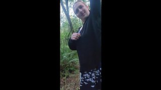 Femboy heads thong-less in public woods! Transgirl beefstick and backside stick out from sundress