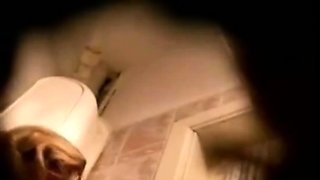 stepmom's toilet visit (spy cam)
