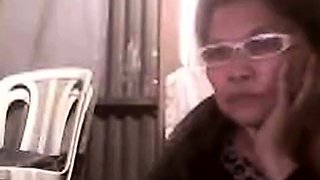 57-Year-Old Asian Granny Flashes on Webcam