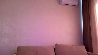 Busty curly brunette with big boobs fucks on couch