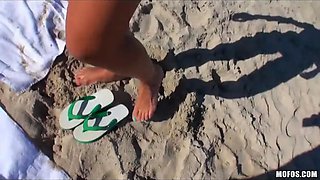 Nikki Chase is picked up while tanning on the beach for assfucking