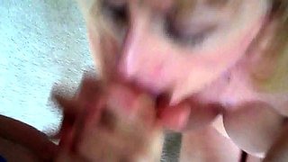 Mature milf in glasses giving handjob to lucky guy in POV