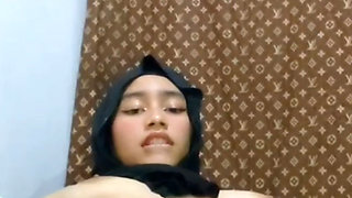 Horny Black Hijab Masturbates Until Her Pussy Is Wet