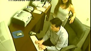 Handjob slut jacking off her boss at his office on spycam