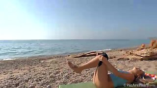 Hairy chick Riana S makes a splash at the beach - WeAreHairy