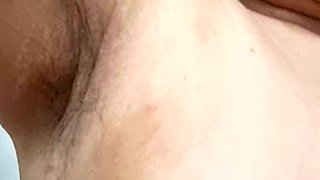 Wife has a lot of hair on her pussy, her armpits are growing hair and she shows her adorable tits