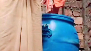 Desi Village girl taking a bath openly at her friend house and fingering her pussy. Viral xxx video