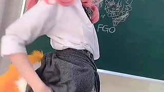 Naughty schoolgirl performs sensual striptease in class