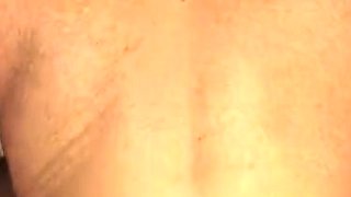 Brunette seductress working her big boobs and hot ass