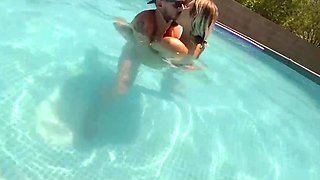 Busty milf goes skinny dipping and gets dicked down in a pool