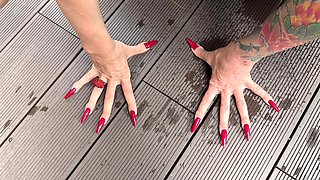Long Red Nails and Long Fingers in Swimming Pool