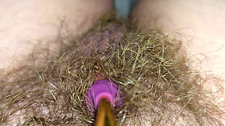 Big Hairy Cunt Trying Out A New Vibrator.