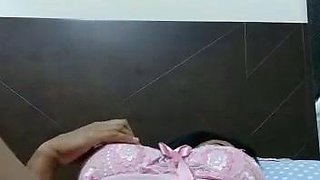 Dorothy Black and Britney use the toy