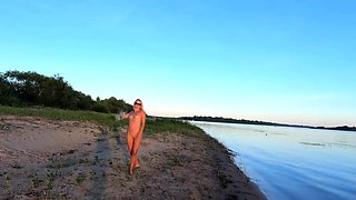Russian Nudist on the River Shore