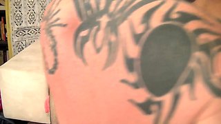 Busty curly brunette with big boobs fucks on couch