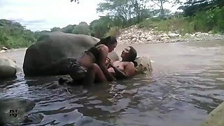 Fucking secretly in the river