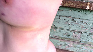 Getting naked in the shed for slapping her tits