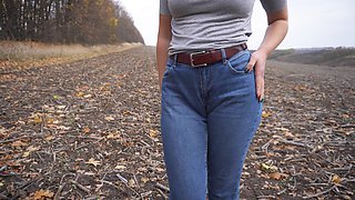 MILF Teasing Her Big Cameltoe in Blue Jeans Outdoors