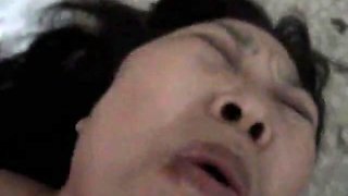 Mature Chinese wife fucking and sucking big cock