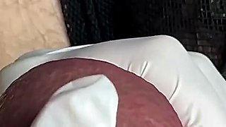 Glans Game with White Latex Gloves in Super-closeup. Alternative View.