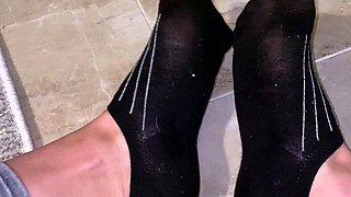 Sexy leggy brunette enjoys foot fetish