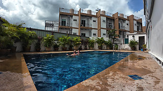 watch us playing in our swimming pool