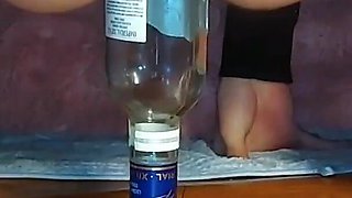 Sister Jumping on a Giant Bottle