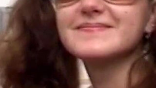 Horny pigtail brunette jerks his cock and gets a warm load on her tits