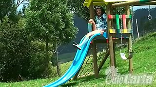 Pretty Carla gets naked on the playground