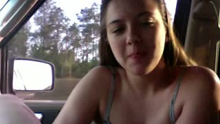 Flexible brunette chick with tender tootsies sucks her toes in a car