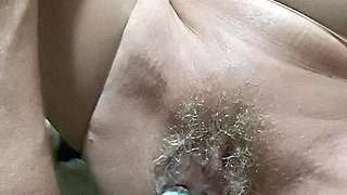 Housewife in the Kitchen with Brush in Pussy