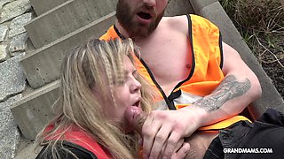 Mature chubby woman is fucked by two young guys in public