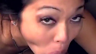Hot Asian babe kneels down and does more blowjob with huge cock from gloryhole