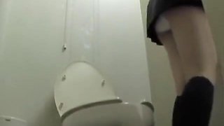 Asian girl is masturbating sitting on the toilet bowl DBAL007