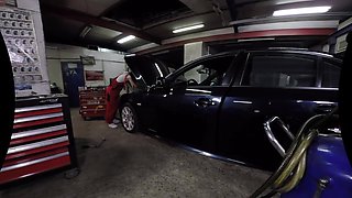 Cute Female Mechanic Plays Solo in the Car Service